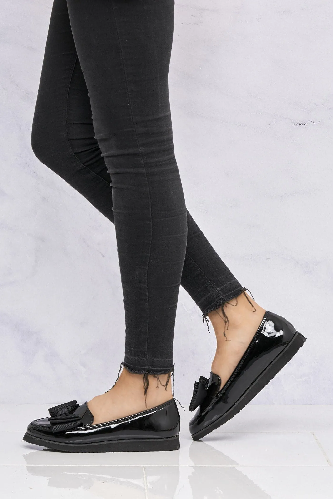 Ada Bow Detail Cleated Flatform Sole Loafers in Black Patent