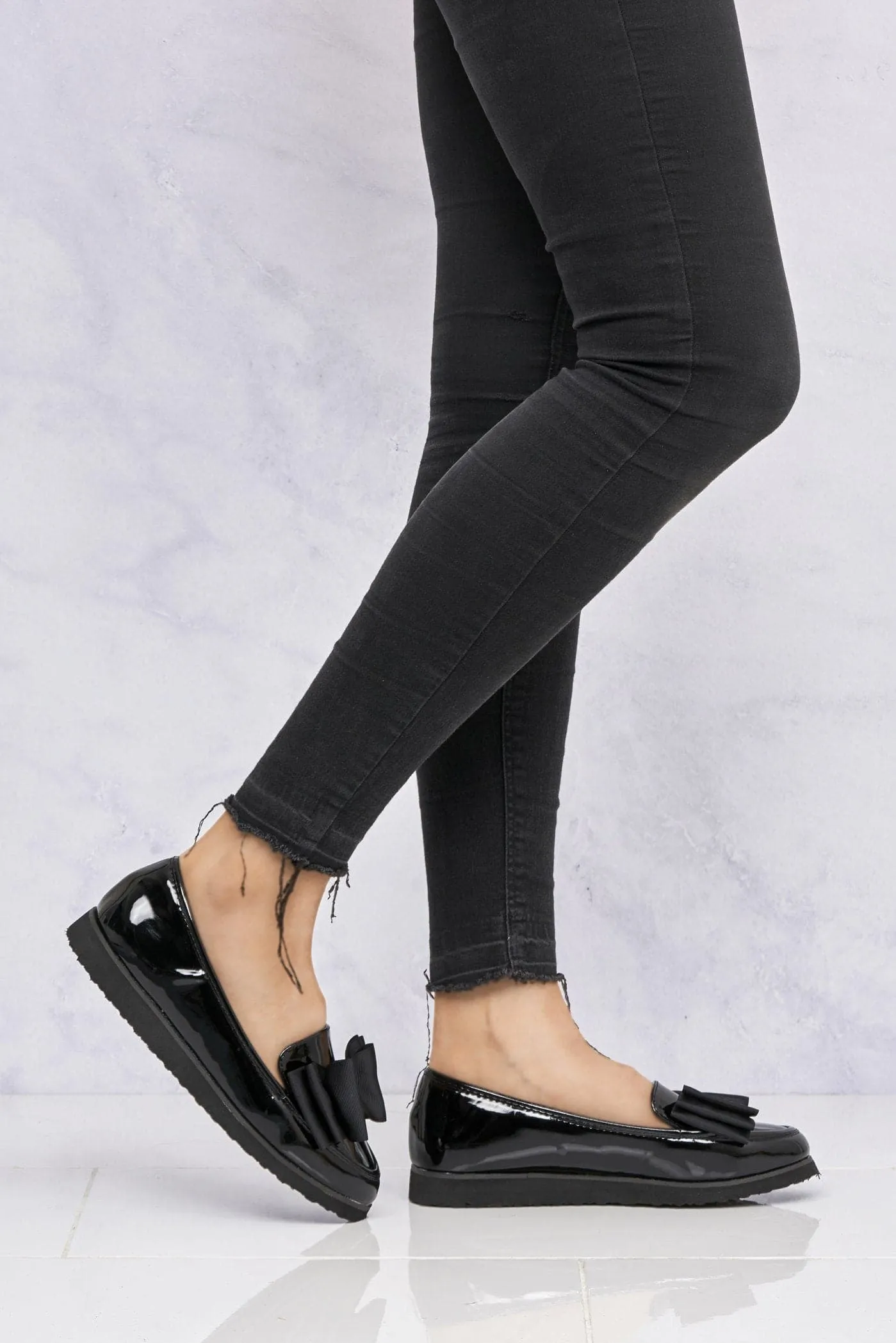 Ada Bow Detail Cleated Flatform Sole Loafers in Black Patent