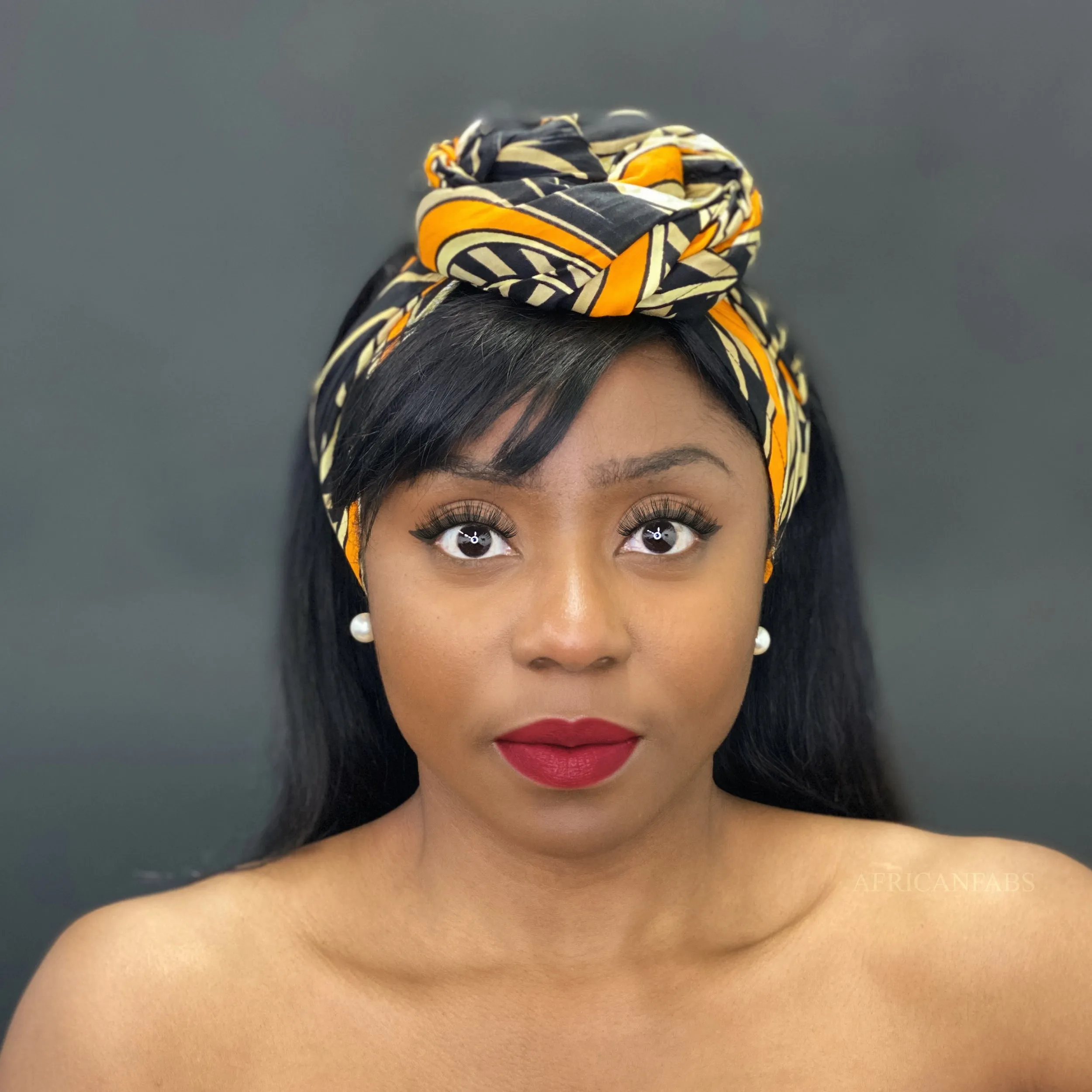 African headwrap - Black / orange Waves